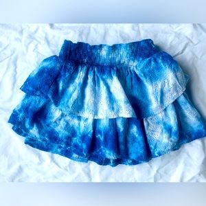 Mini skirt with shorts underneath.